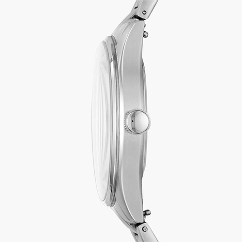 Close-up of a silver watch with a clear face on a white background